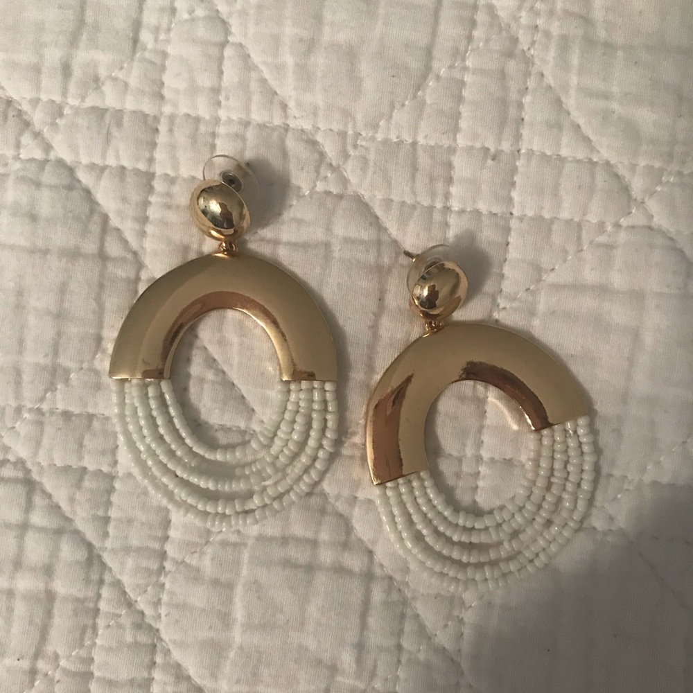 Beaded and gold loop earrings.